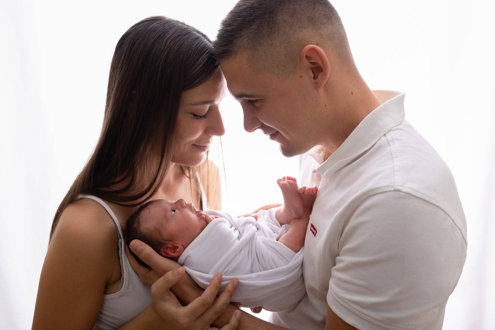 Mama und Papa mit Baby